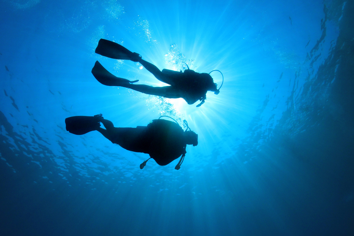 Couple Scuba Diving underwater